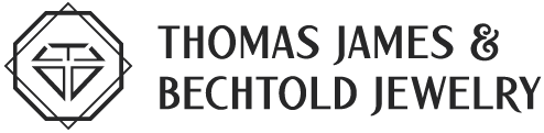 The Thomas James & Bechtold Jewelry Logo. The symbol contains an octagonal border with a gemstone outline enclosed. The text reads "Thomas James & Bechtold Jewelry".
